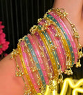 Multi-Coloured Festive Glass Bangle Set with Golden Ghungroo Latkans